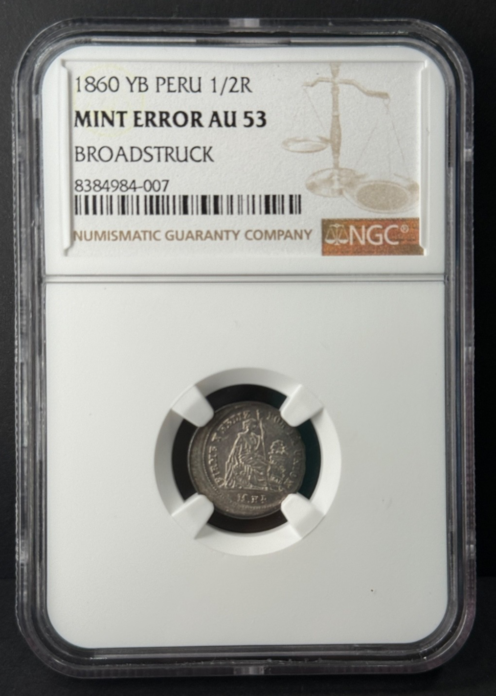 Peru - 1/2 Real - 1860 (YB) Mint Error Broadstruck NGC AU53
