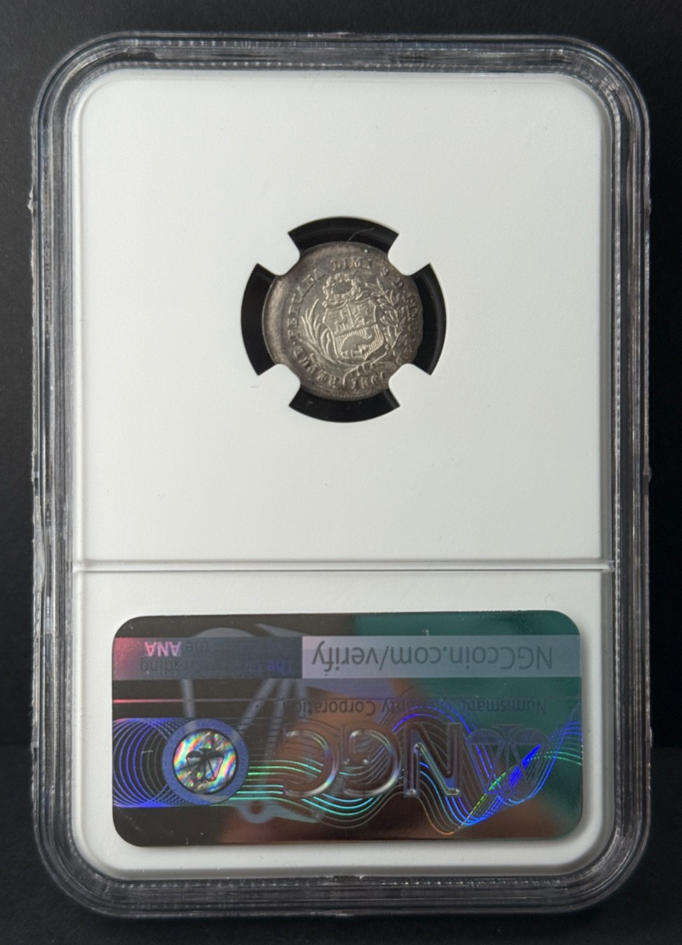 Peru - 1/2 Real - 1860 (YB) Mint Error Broadstruck NGC AU53
