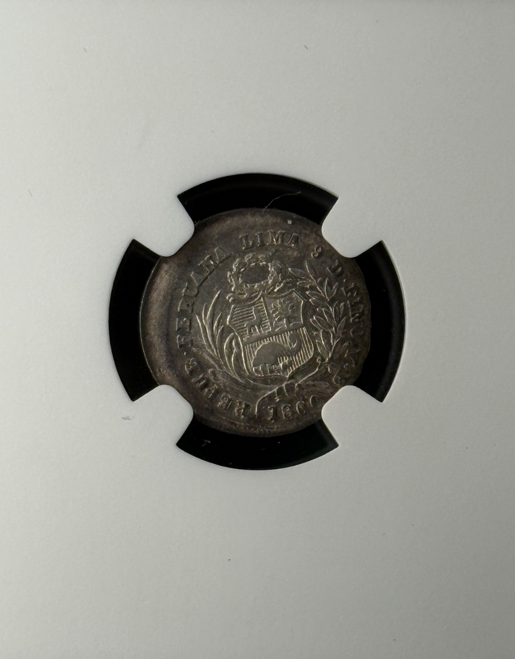 Peru - 1/2 Real - 1860 (YB) Mint Error Broadstruck NGC AU53