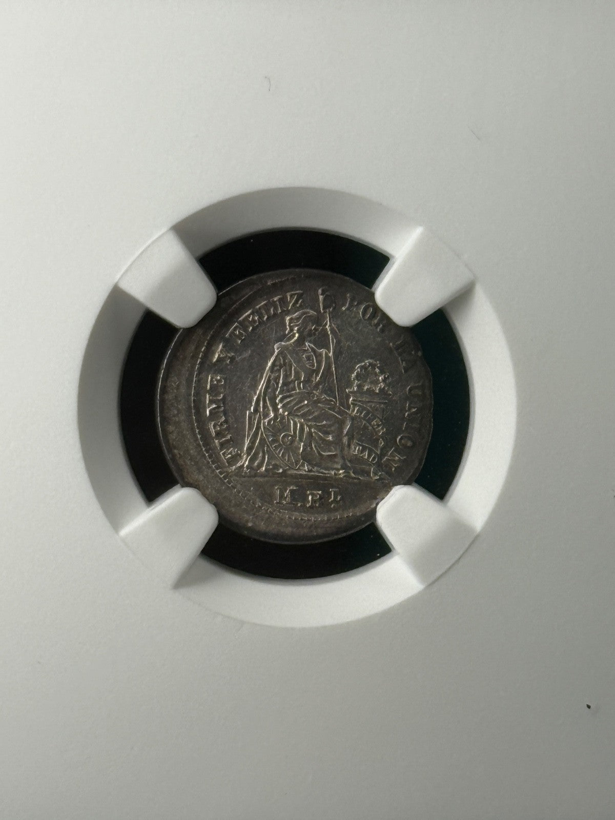 Peru - 1/2 Real - 1860 (YB) Mint Error Broadstruck NGC AU53